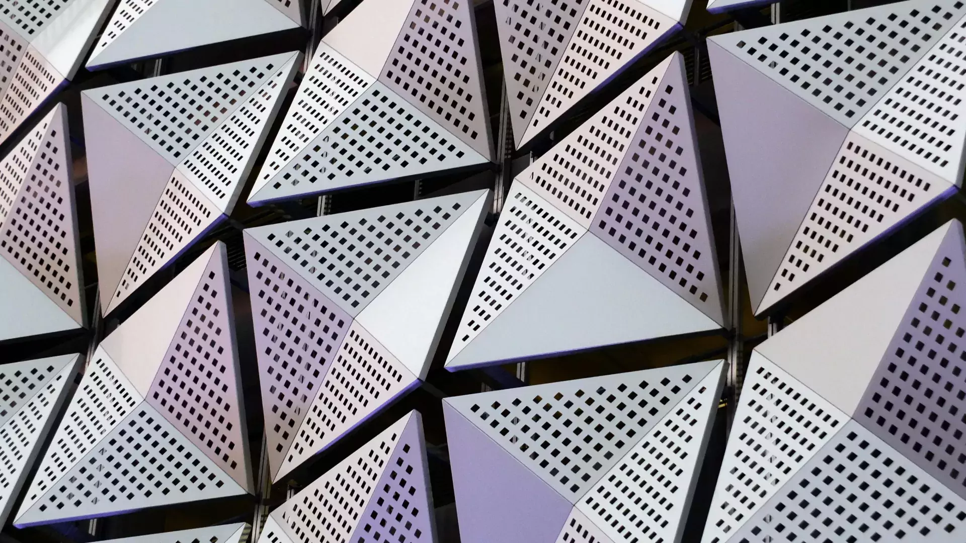 silver geometric steel cladding with angular patterns