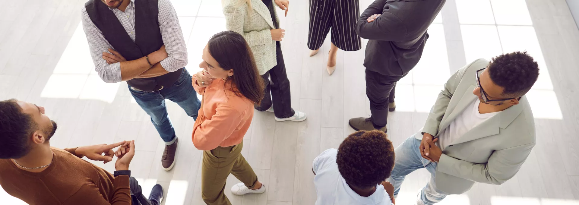 Young people meeting, interacting and making contact during a business meeting