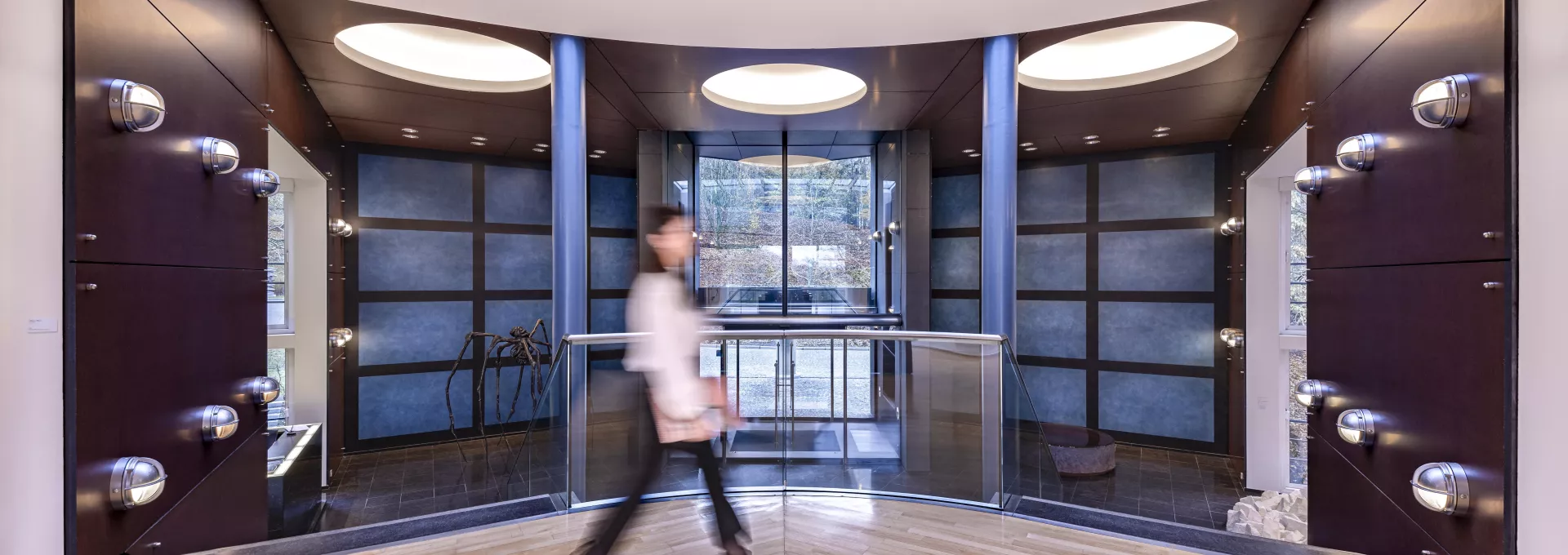 woman walking in the entrance of a building
