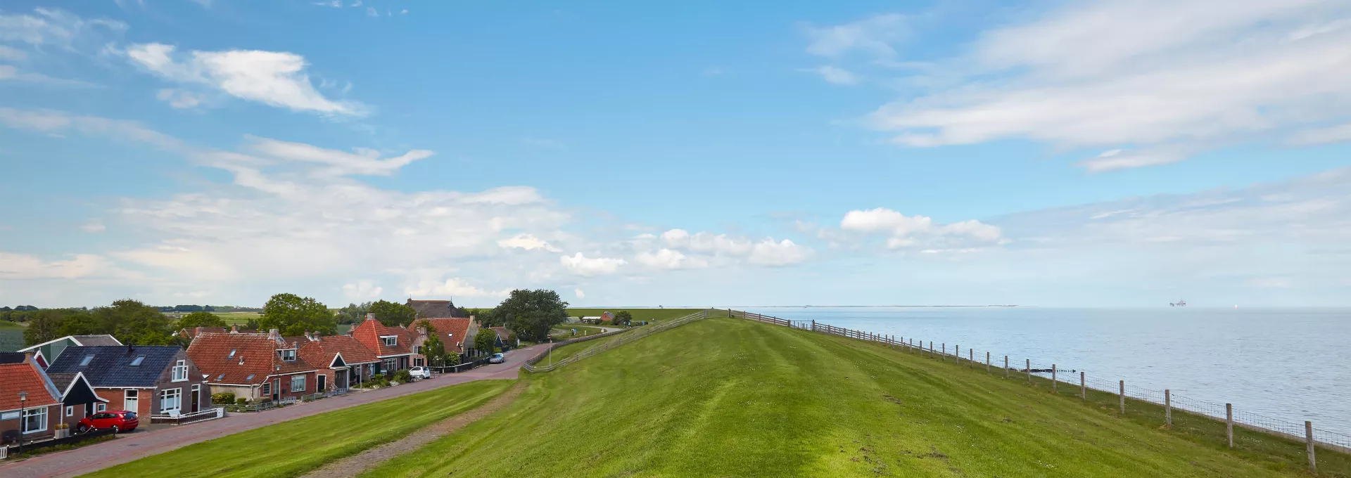 A village protected from the sea by a dike