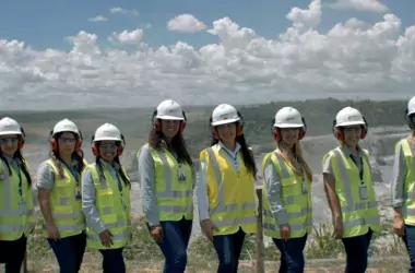 several women in PPE in plant in Brazil