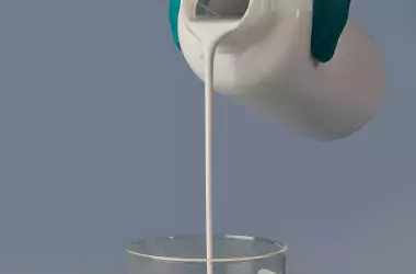 adding a milk of lime to a laboratory container