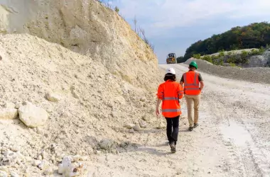 two persons walking in quarry