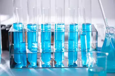 test tube filled with a blue liquid 