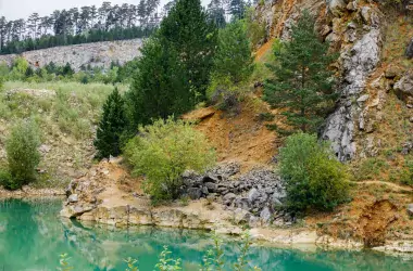 quarry with trees and lake