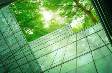 glass building and trees