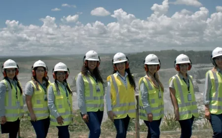 several women in PPE in plant in Brazil