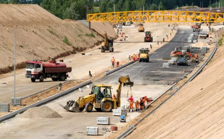 overview of workers on a construction site for a new road
