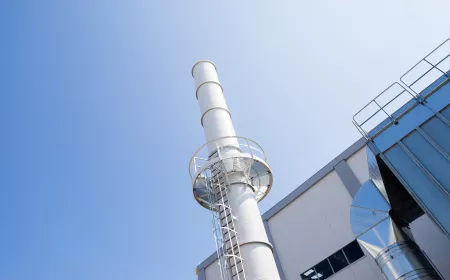 Close-up on a flue gas treatment factory chimney