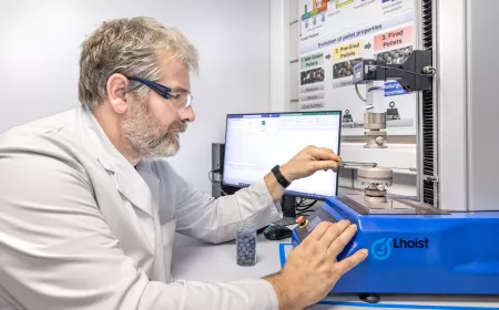 A man in lab checking some analysis and datas