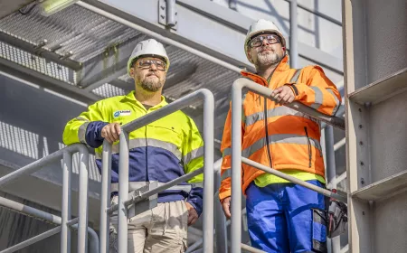 employees at Lhoist working on a platform