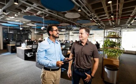two person talking in an office