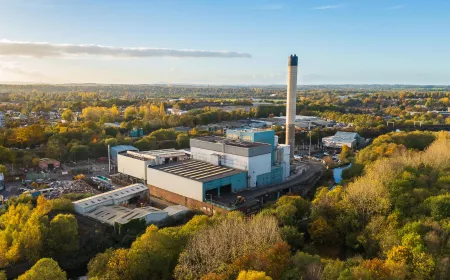Aerial view of an Energy from Waste generation plant in Wolverhampton, UK, with chimney and surrounding buildings, a factory converting non recyclable waste to energy
