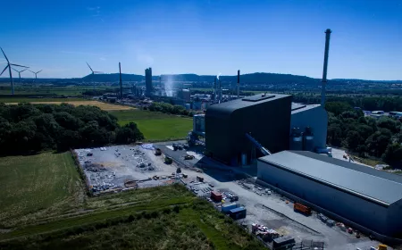 view of an incineration plant with a blue sky