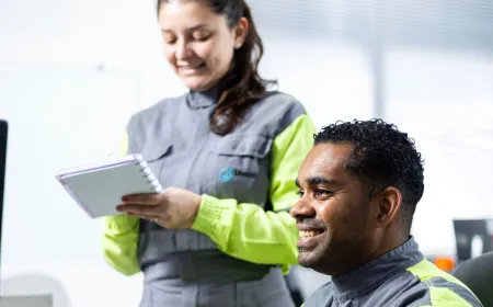 Two people working in office in Brazil
