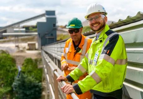2 men in PPE at the plant of Hindlow