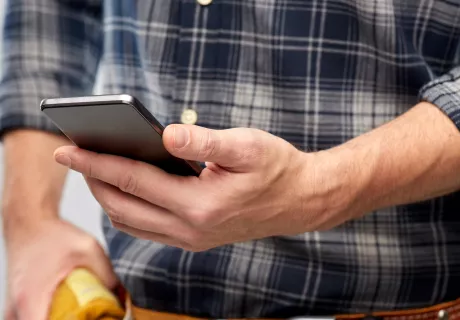 hand with mobile phone